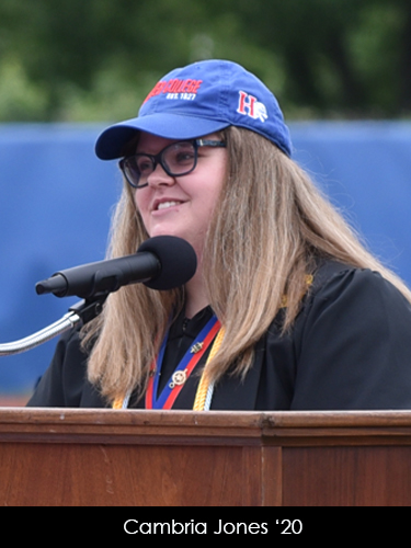 Cambria Jones gives speech in regalia