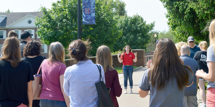 Amanda Butler gives a tour of Hanover College and speaks to a group