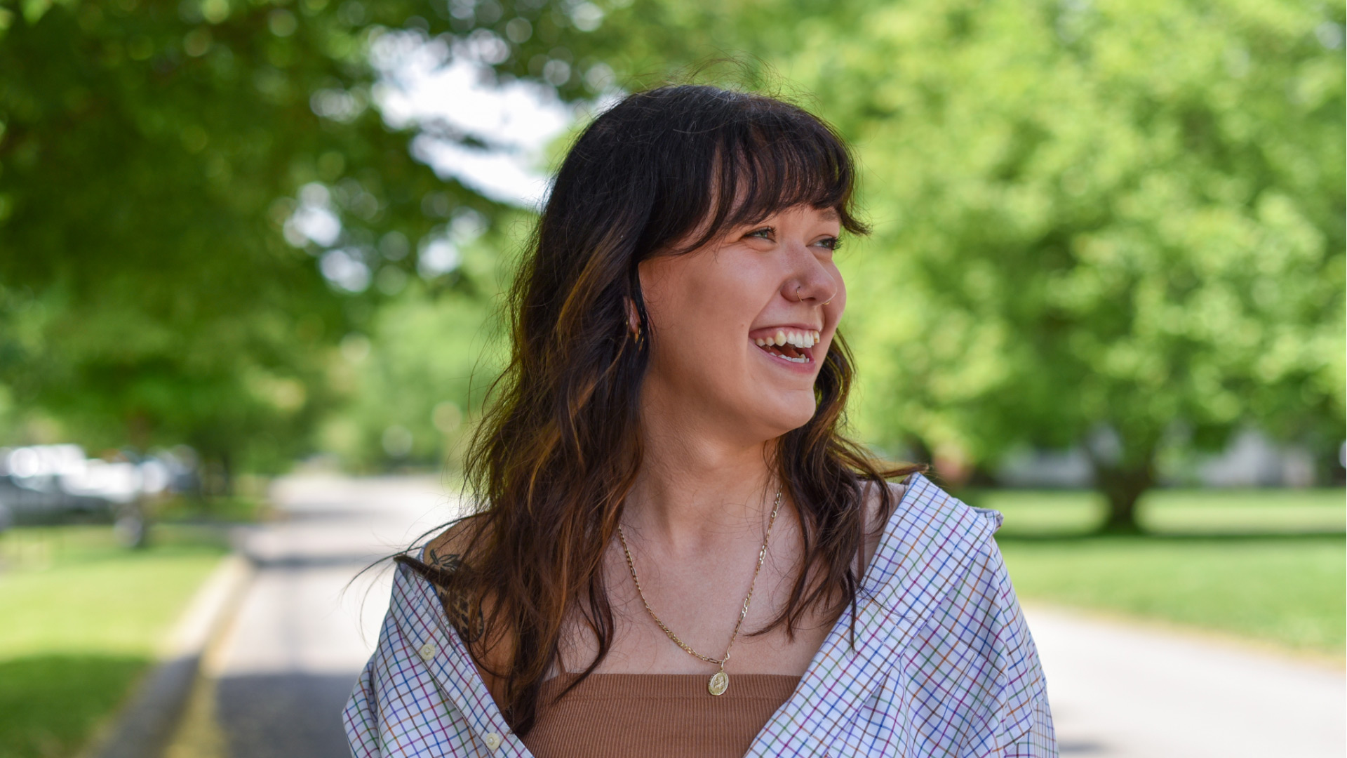 Stephanie Johnson laughs outside on the Hanover College campus