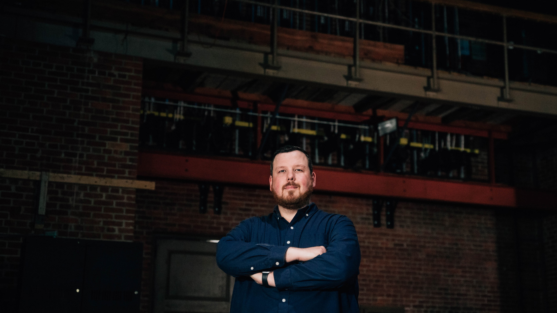 Gabe Vanover stands in The Other Place theatre