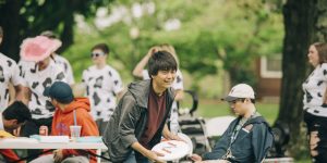 International student throwing a frisbee
