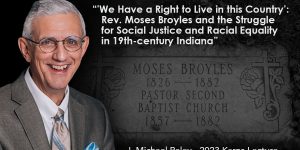 History Professor J. Michael Raley and the headstone of Moses Broyles