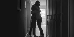 Wagoner-Meade to explore community-building through the empowering qualities of grief Sad couple hugging