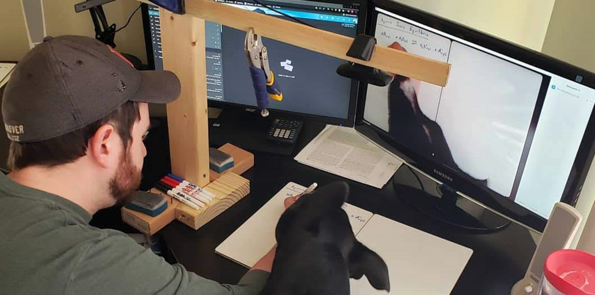 Hanover professor Tim Cunningham teaches virtual class with dog